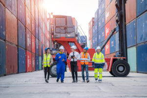 manager and cargo container worker having discussion on working