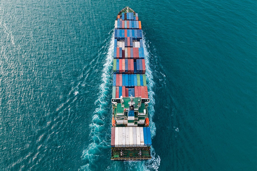 aerial view cargo ship chemical sourcing